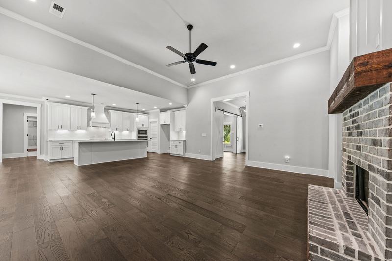 Open-concept view across great room and kitchen